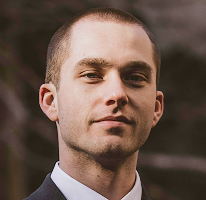 Portrait of Thomas Whitfield, a cryptocurrency market analyst and trading expert